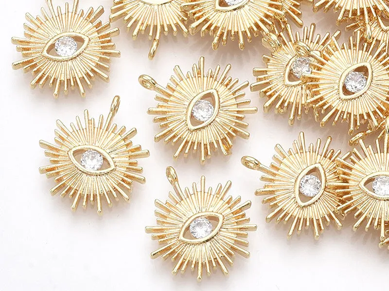 La Petite Epicerie Soleil bedel zon met oog 18K verguld