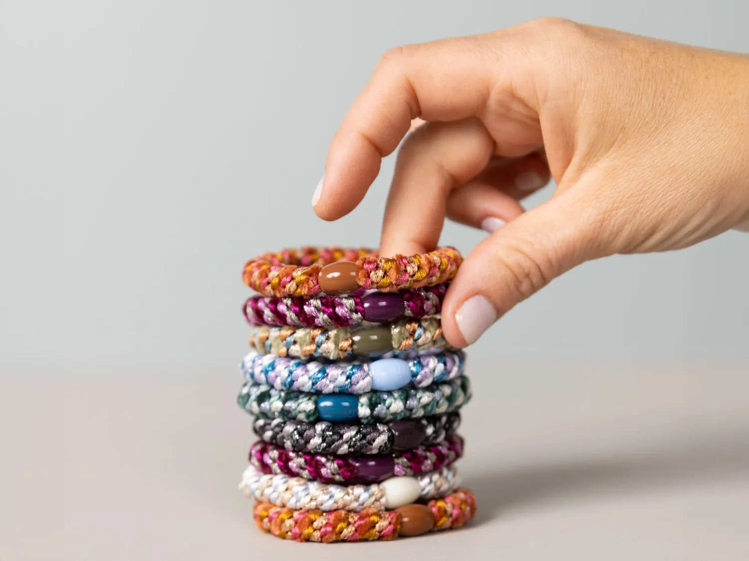 Kknekki haarelastiek Rood Bubblegum Raye rood gestreept per stuk